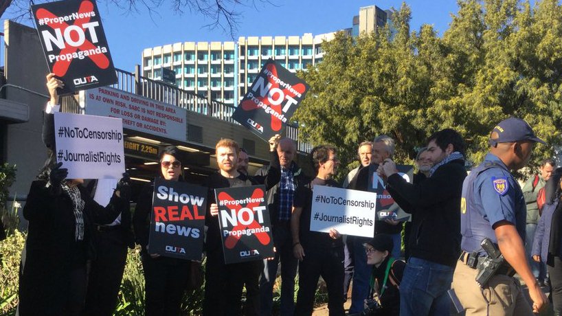 UlrichJvV's tweet photo. We will NOT be silenced! We stand firm against media censorship despite police approaching! #BlackFriday #SABCPicket https://t.co/q6Ls5hq3HO