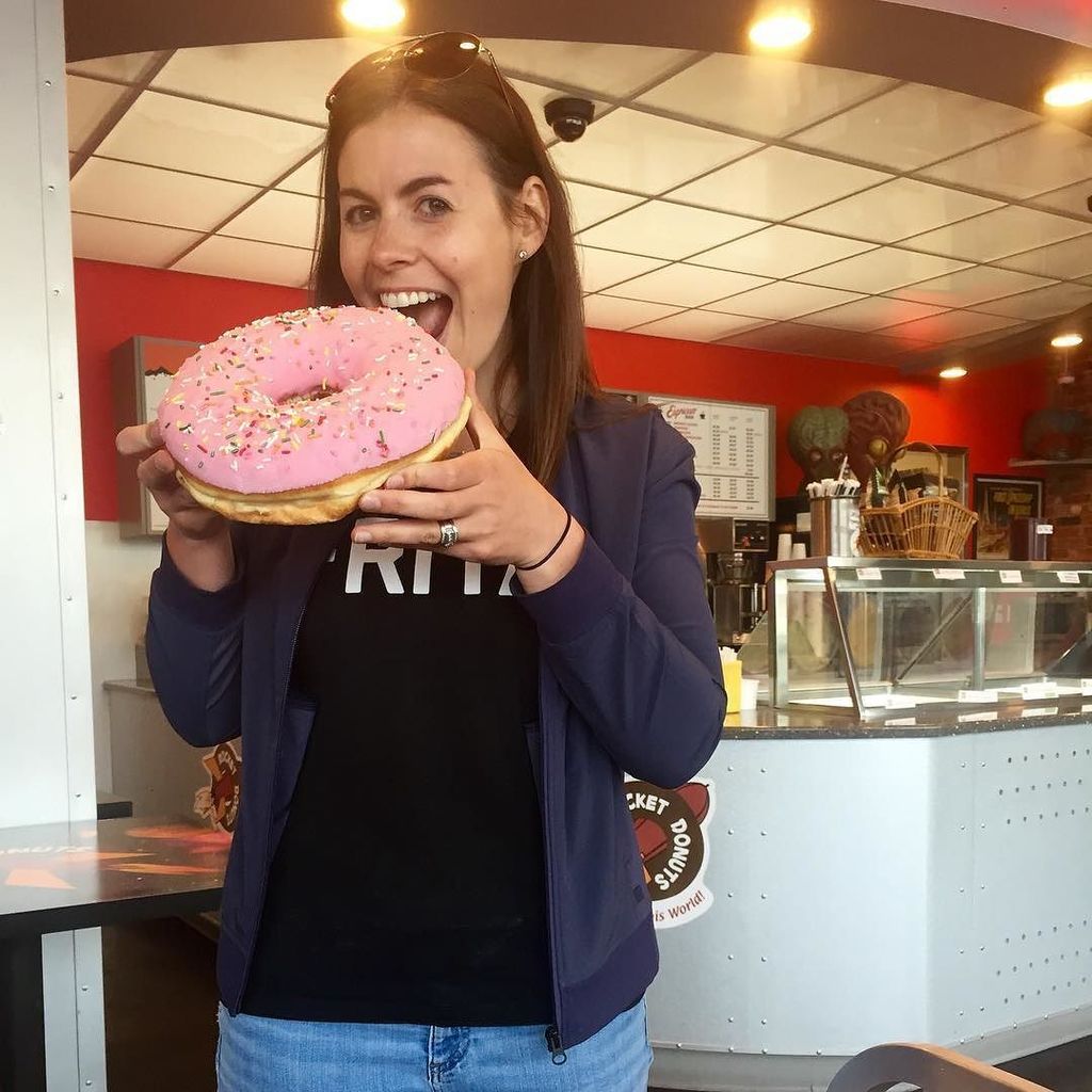 Dibbler2's tweet photo. My tiny wife and her regular sized donut. #rocketdonuts #bellingham #monsterring https://t.co/Wz64tQIBTd https://t.co/8iot3WjbK6