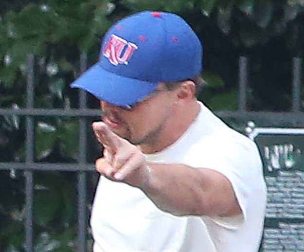 BuzzFeed's tweet photo. Leonardo DiCaprio’s taxi-hailing technique is aggressive https://t.co/kLeYPVbGRb https://t.co/A07o8kozSO