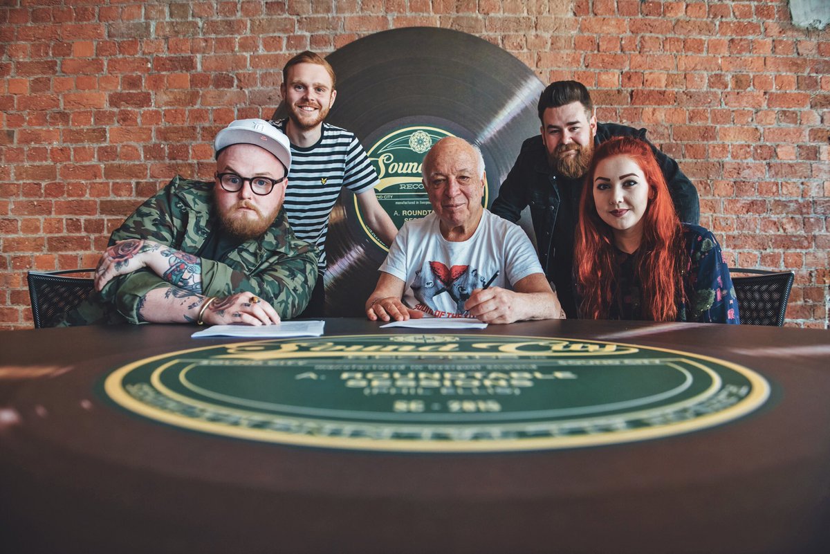 WE'VE JUST SIGNED A MAJOR RECORD DEAL WITH WARNER BROTHERS RECORDS!