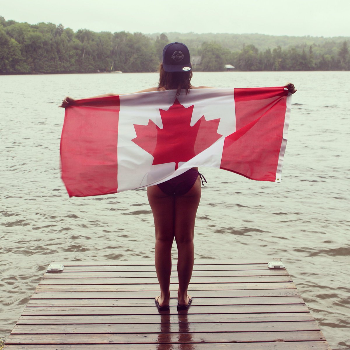 MuskokaApparel's tweet photo. Happy Canada Day, from our rainy dock to yours! 🇨🇦☔️ https://t.co/61dXP29sFZ