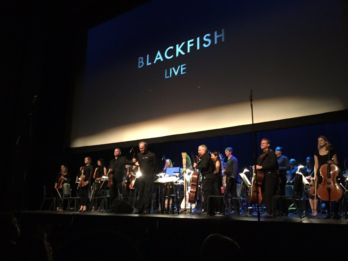 al_B_chang's tweet photo. Watching composer @JBealMusic conducting his score live to @blackfishmovie with @TheJoshuaButler. Quite a concert! https://t.co/YBDLUPbcfn