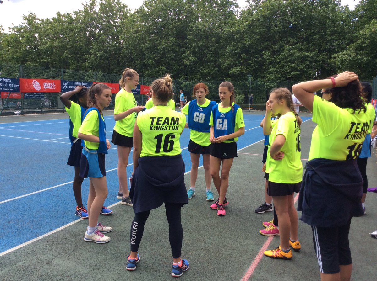 <a href="/RBKingston/">Kingston Council</a> trail at half time, but coach Katie is giving the girls a rallying team talk <a href="/tiffinnetball/">Tiffin Netball</a>
