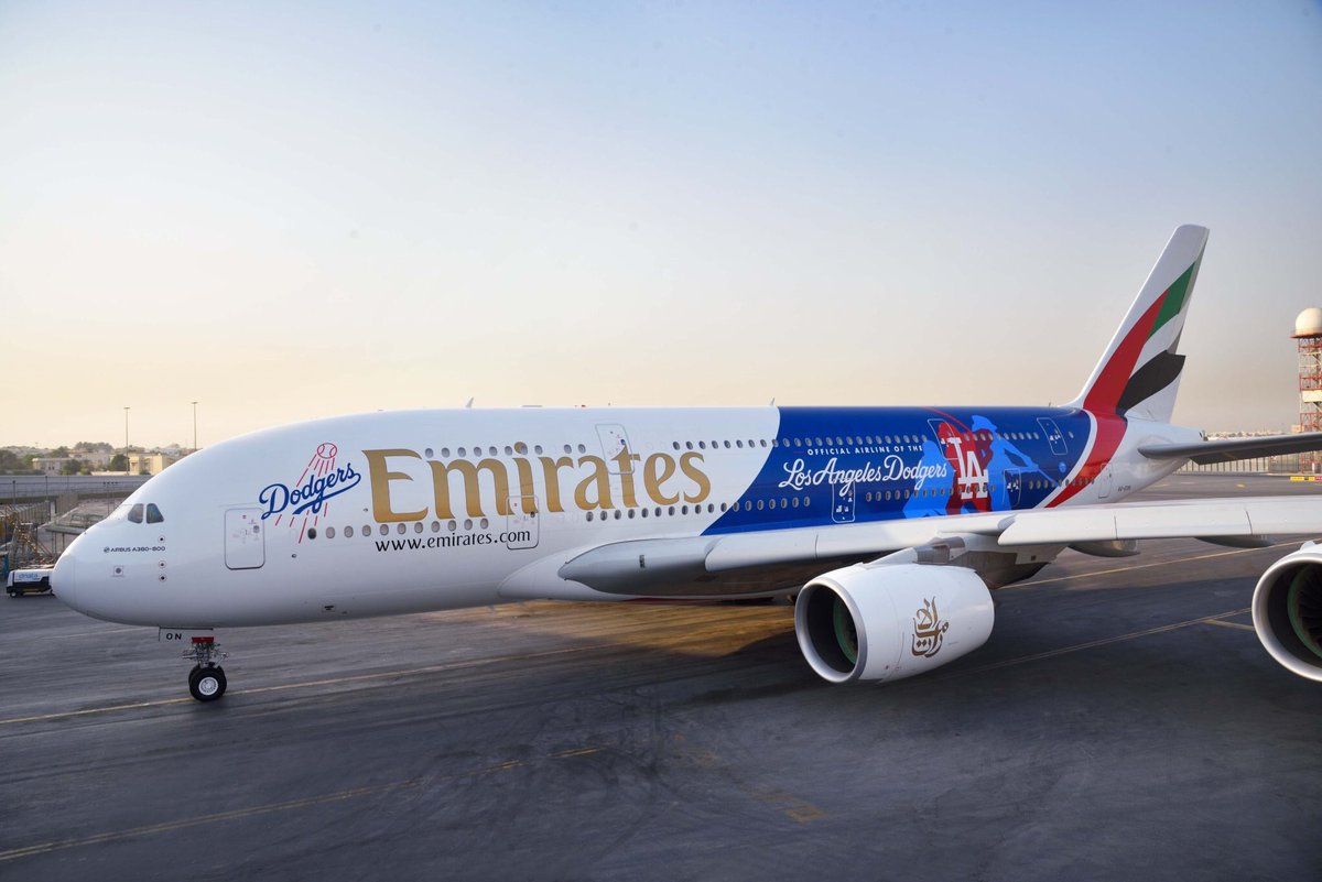 DXBMediaOffice's tweet photo. Emirates 2nd daily A380 flight from #Dubai to @flyLAXairport lands in Southern California with @Dodgers branding https://t.co/gIZlME8lHu