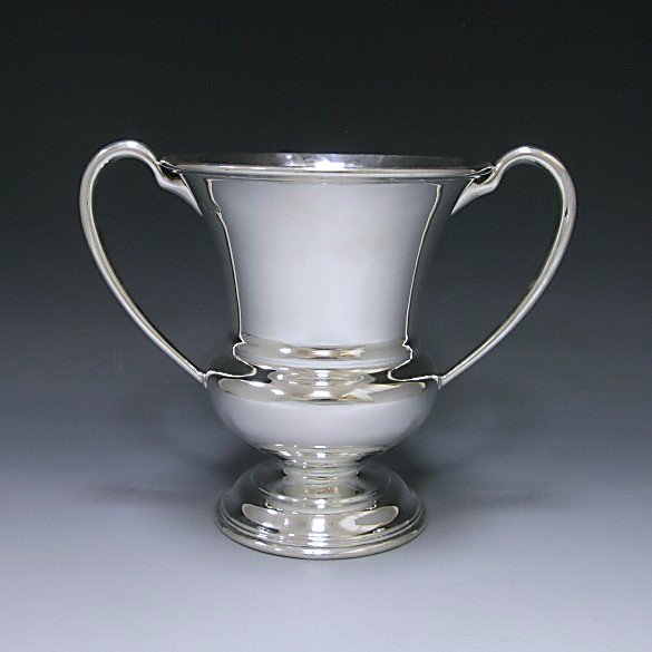WWalterSilver's tweet photo. Very excited to see who will be holding the cup today, our version may not be as grand! #antique #silver #wimbledon https://t.co/DyqSjwRtdw
