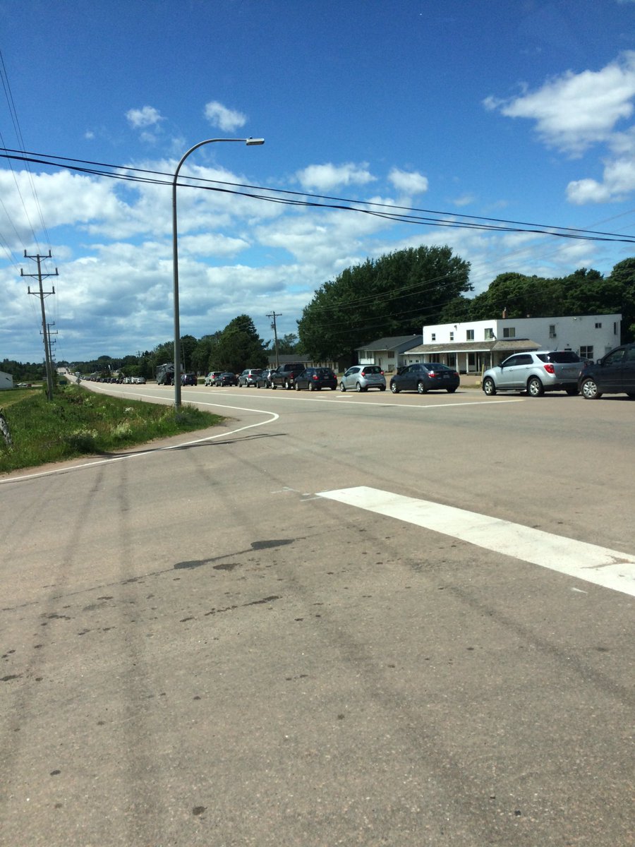 AndrewMacKay8's tweet photo. Traffic lined up to #HowattsShell for the #ConfederationBridge how bout opening a few more lanes?? #pei https://t.co/5BRkG1cFOt