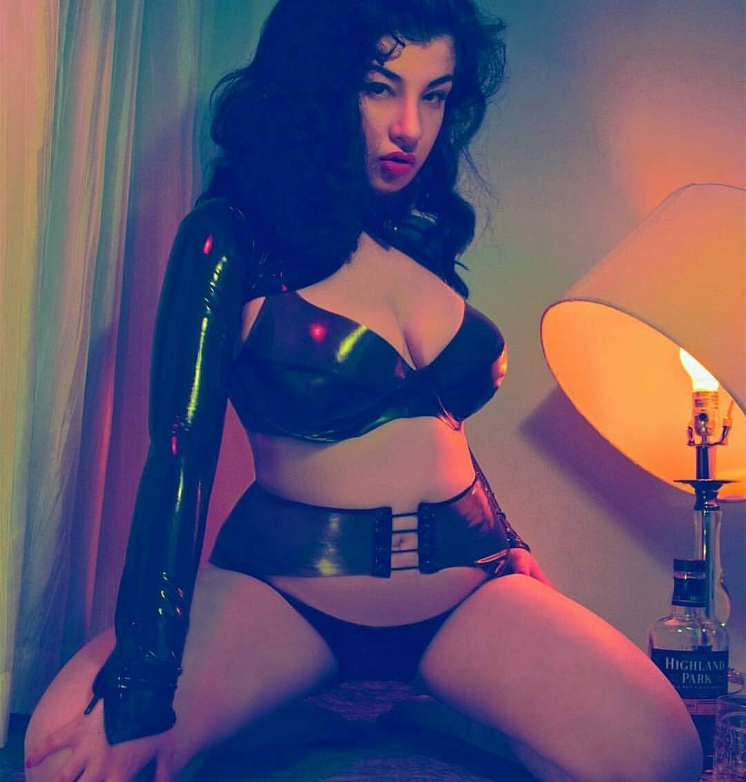 .@HollyHarlott models some of our #latex lingerie. raezorlatex.com/#!bondage-bott…