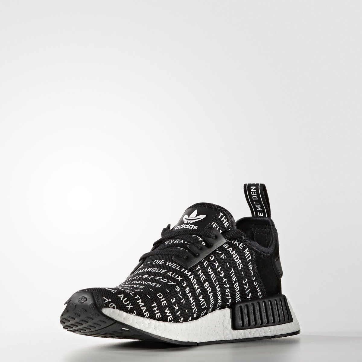 nmd black with white writing cheap online