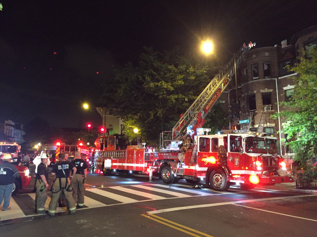 conradtribble's tweet photo. Huge DC Fire response to row house fire on Calvert. #adamsmo https://t.co/HnD93kTZLy