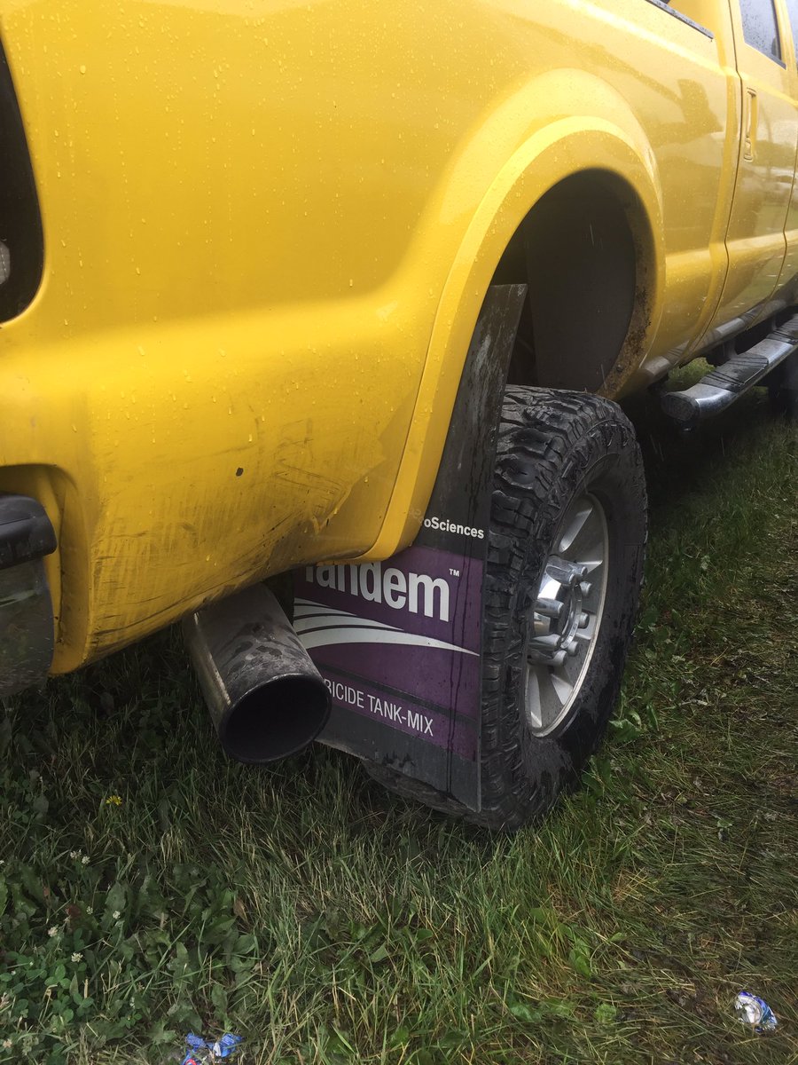 T_Bartman's tweet photo. The most farmer mudflaps I've seen in my years. But it's a Ford so does it count? #CFest16 https://t.co/8UcTonulnp