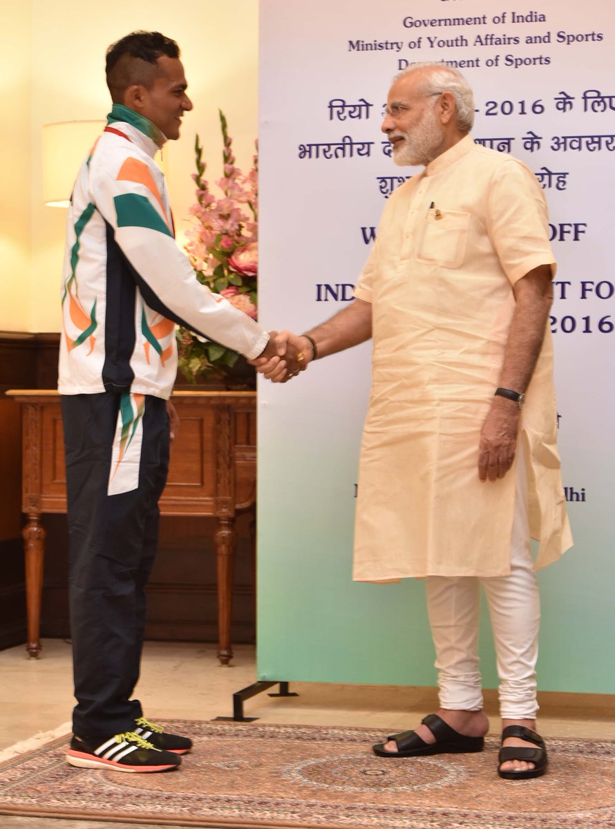 narendramodi's tweet photo. Delighted to meet men’s marathon runner @NrawatSingh. Wished him good luck. https://t.co/uCJUInM8zX