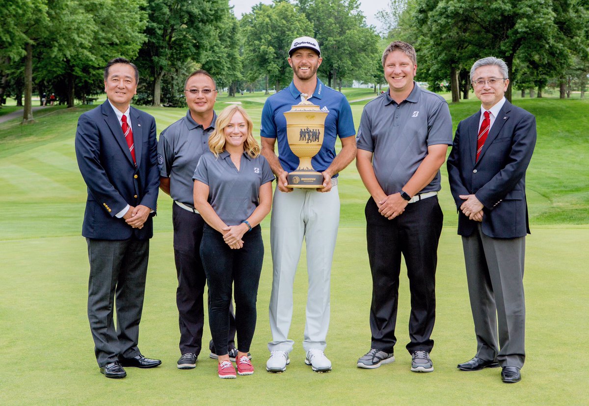 JordanWenck's tweet photo. Took a quick break in the winners circle last night. Congrats to @DJohnsonPGA! #BridgestoneINV #trophyready https://t.co/LM0EDQpPIb
