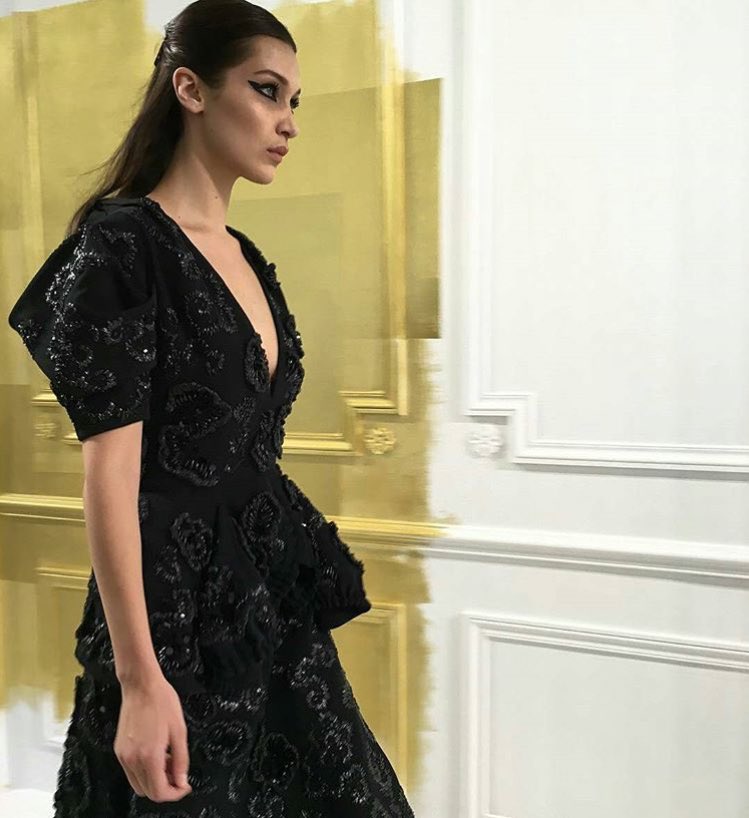 Bella Hadid walking for Dior Couture Autumn-Winter 2016-17.