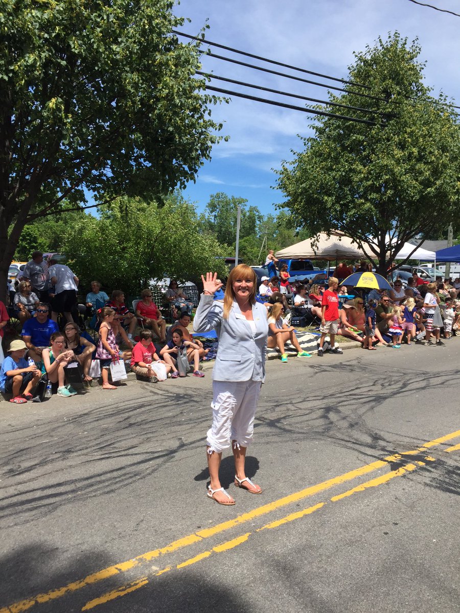 Kristy Mazurek waves hello at the Fourth of July Parade in the Village! 😃