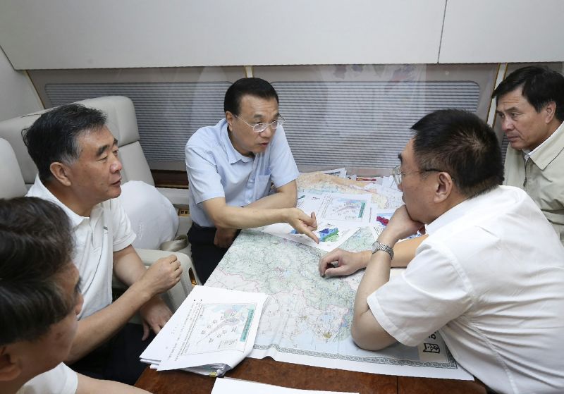 PDChina's tweet photo. Premier Li Keqiang embarks on flight to flood-hit Anhui and Hunan provinces Tuesday to inspect relief operations https://t.co/1Q3tVh93eG