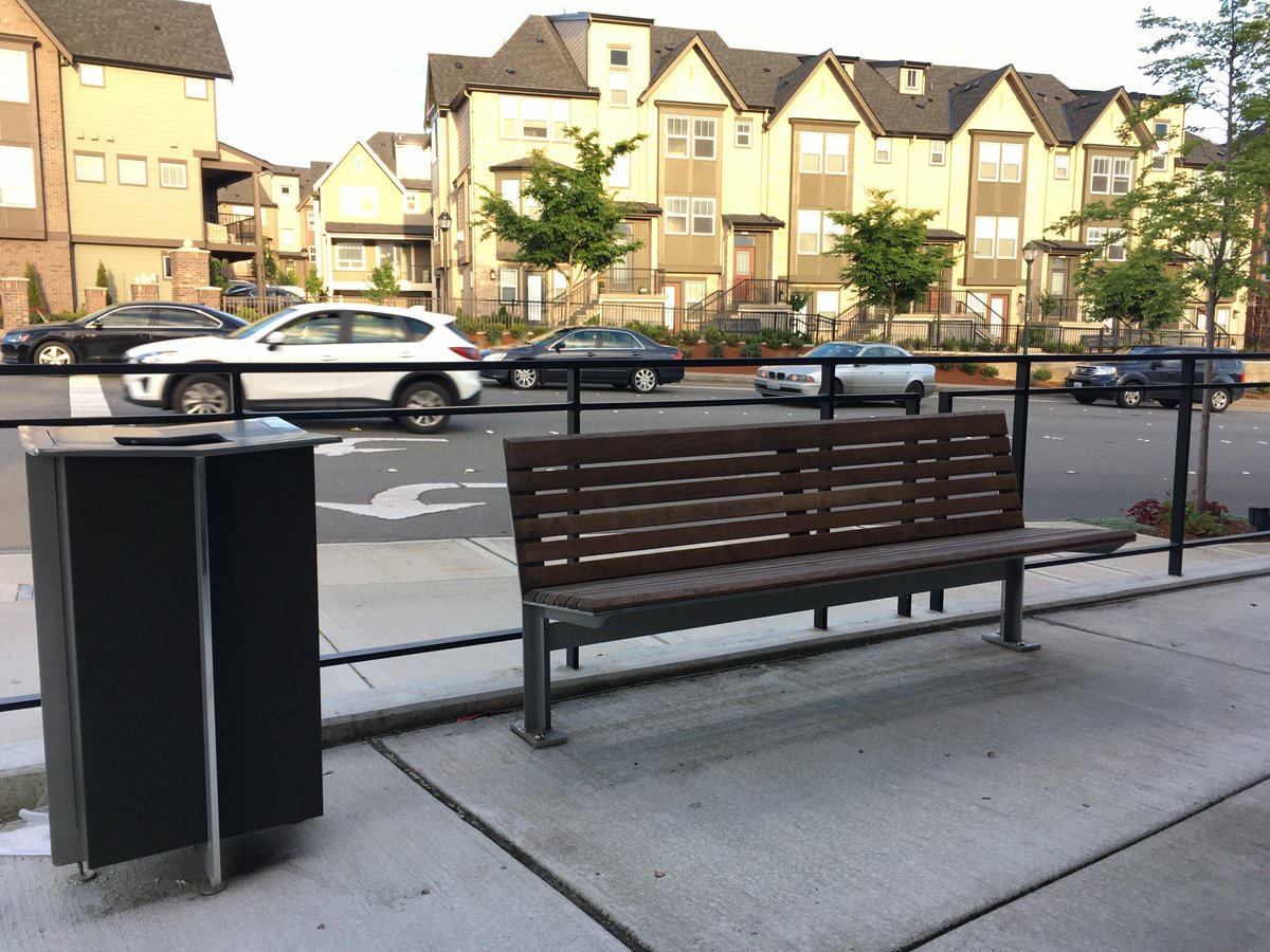 benchesofissy's tweet image. Home Street Bank in the Highlands has this bench for its patrons. Also a fancy trash can and some odd bike racks.