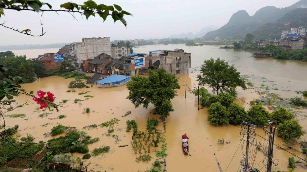 350's tweet photo. 1.5 million people displaced after enormous flooding in China. The face of climate change: https://t.co/09DsHnwgaY https://t.co/pfc7SRlyOu