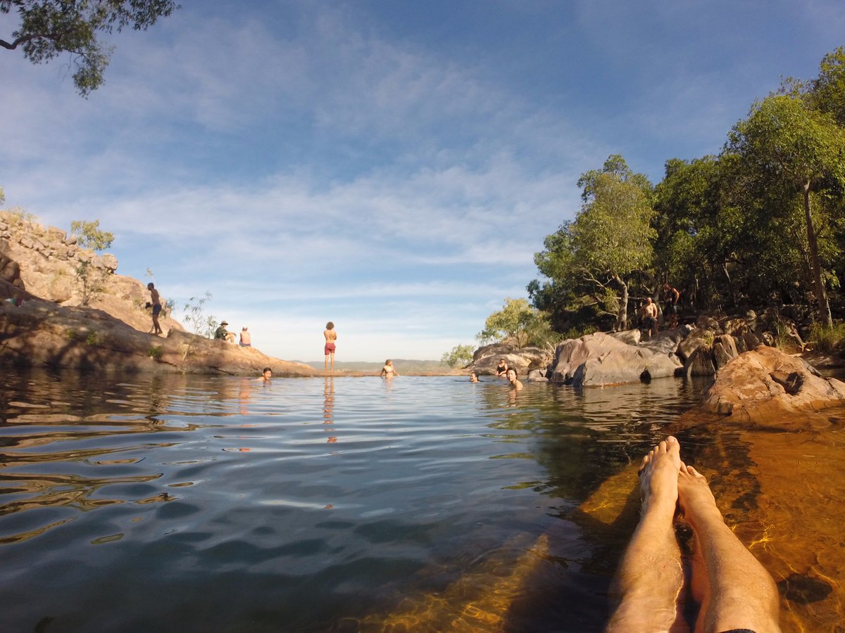 CharterNorth's tweet photo. Our guide Dan enjoying #Gunlom #Kakadu #NTAustralia What a stunning place to relax and unwind! https://t.co/fJKPoPDpJV