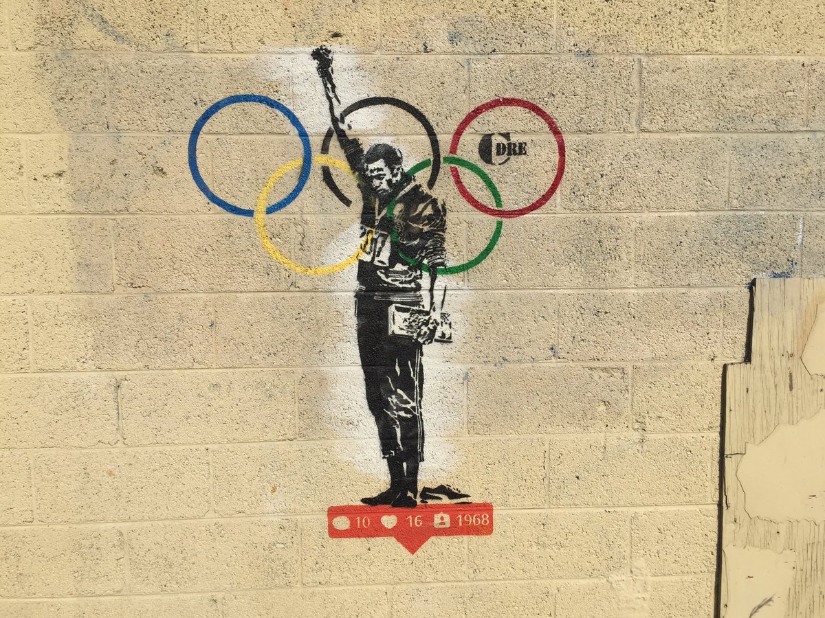 cdre_art's tweet photo. in 1968, tommie smith made this gesture to bring awareness. seems that half a century later, we forgot the past. https://t.co/vz6dq4VpDa