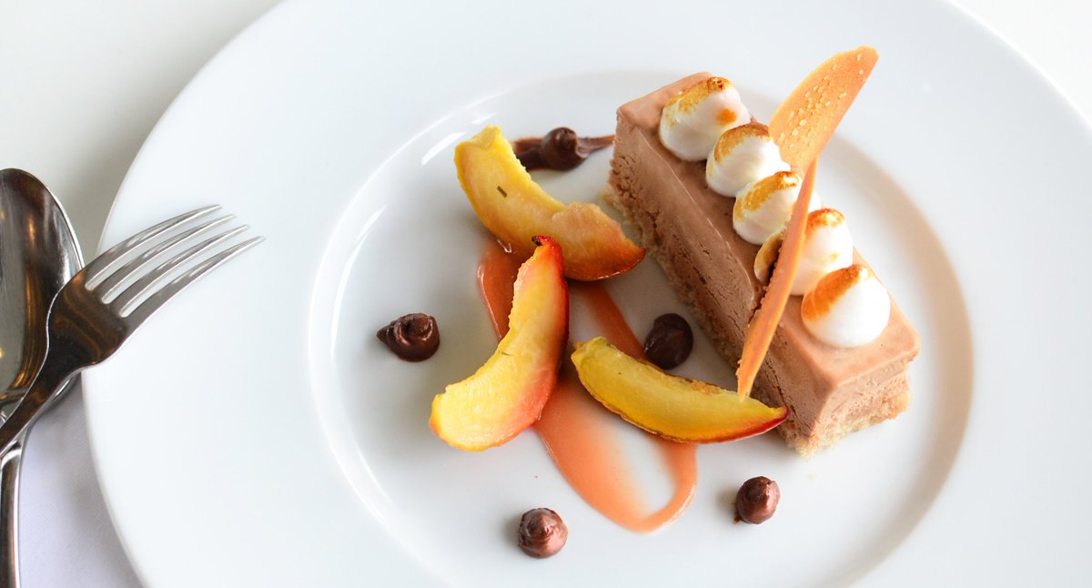 OXO_Tower's tweet photo. Chocolate parfait with roasted pine-infused peaches. 🍑

£32 #SummerDining offer here 👉 https://t.co/WjTpxiBD9t https://t.co/QaYh7wZtwC