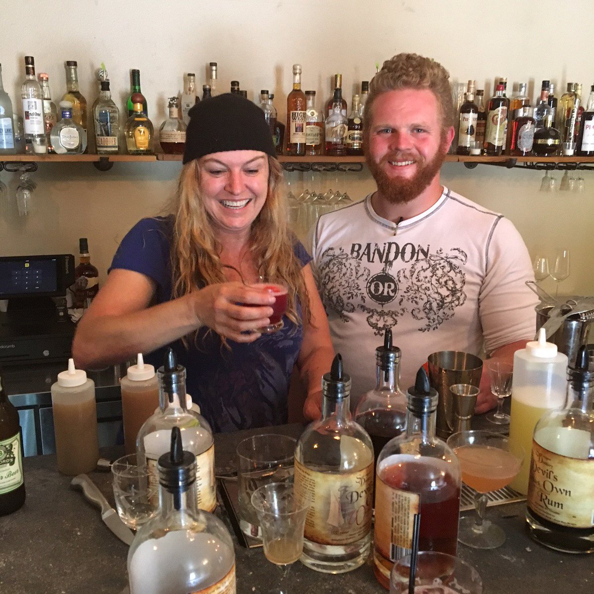 craftmovement's tweet photo. Cornelia and Cody at Speakeasy 33 in Bandon OR. Serving up Quality Drinks with Stillwagon Distillery Cranberry Rum. https://t.co/g3Ft07zd55