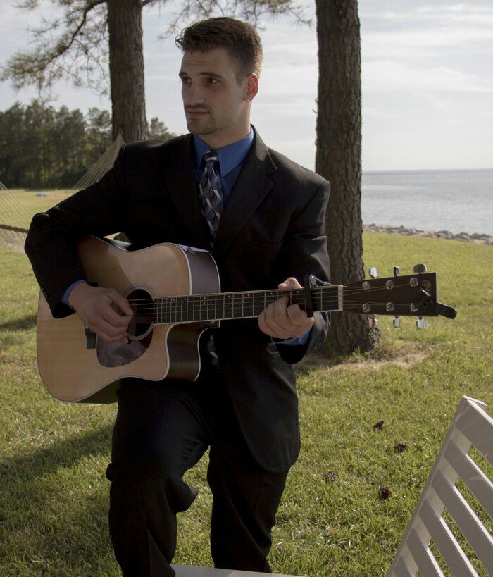 colinbyork's tweet photo. A great shot from my Aunt's wedding. Courtesy of @DaneFiction #GuitarStar #SuitsAndMics #CountryBoy #Fancy https://t.co/3ccWwgBiv0