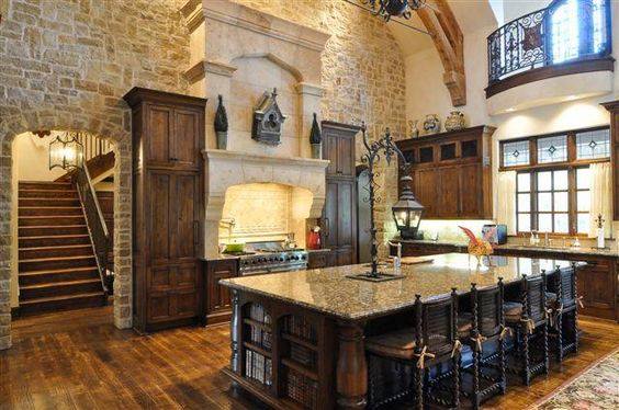 Lovely kitchen. The cabinet colors enhance the warm, inviting and open design.