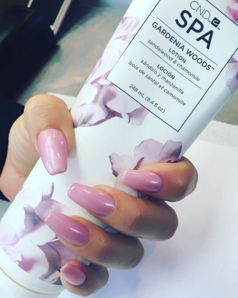 CNDCanada's tweet photo. .@CoutureNails_1 adds a hydrating massage to their clients' manicures using the #CNDSpa Gardenia Woods™ Lotion. https://t.co/KfpmJs7dF2