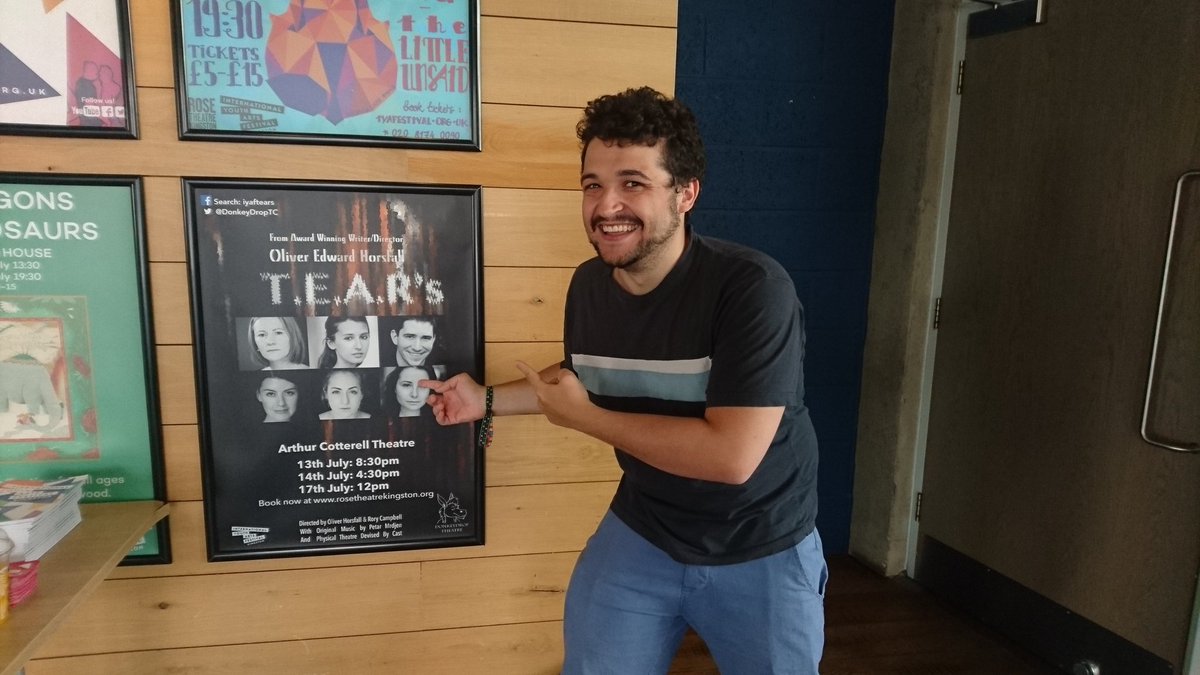OllieHorsfall's tweet photo. @IYAF @DonkeyDropTC @Rosetheatre director and playwright Ollie Horsfall next to the poster for T.E A.R's! #iyaf2016 https://t.co/frXBDBJ5go
