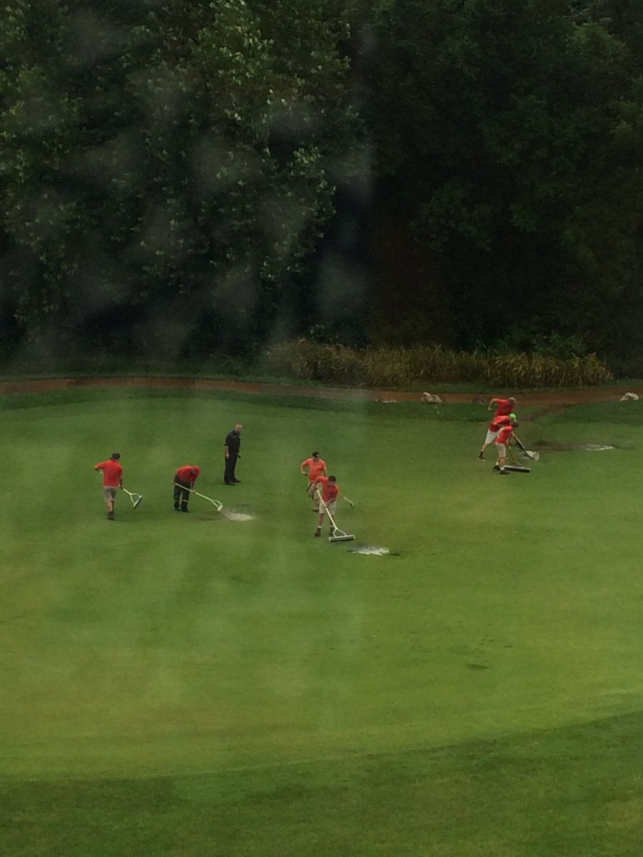 metroopen's tweet image. The best staff in the business! The grounds crew squeegeeing the 18th fairway to get ready for the practice round.