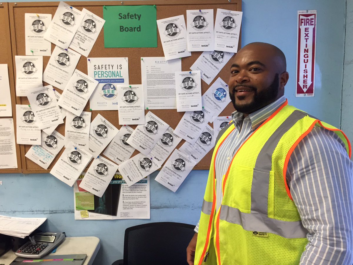 Pompano Safety Manager Jonathan Javier and their "My Safe Actions Affect..." wall for June's National Safety Month.