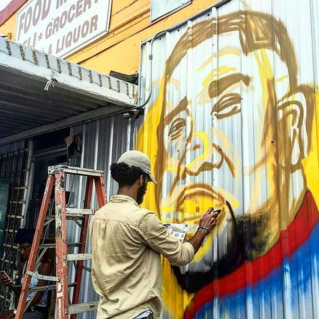 WORLDSTAR's tweet image. The owner of the store that #AltonSterling was killed at allowed for an artist to paint a mural there in his honor