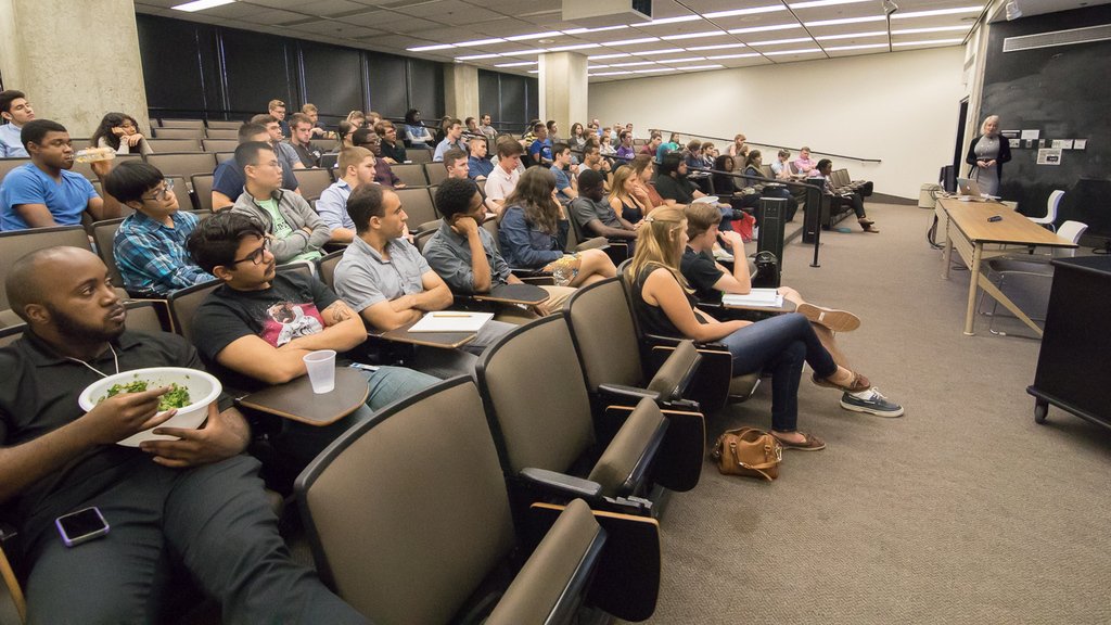 Dr. Snider, left, lectures for #fermilabsummer16 on "Scientific Computing at #Fermilab" while several folks enjoy t…