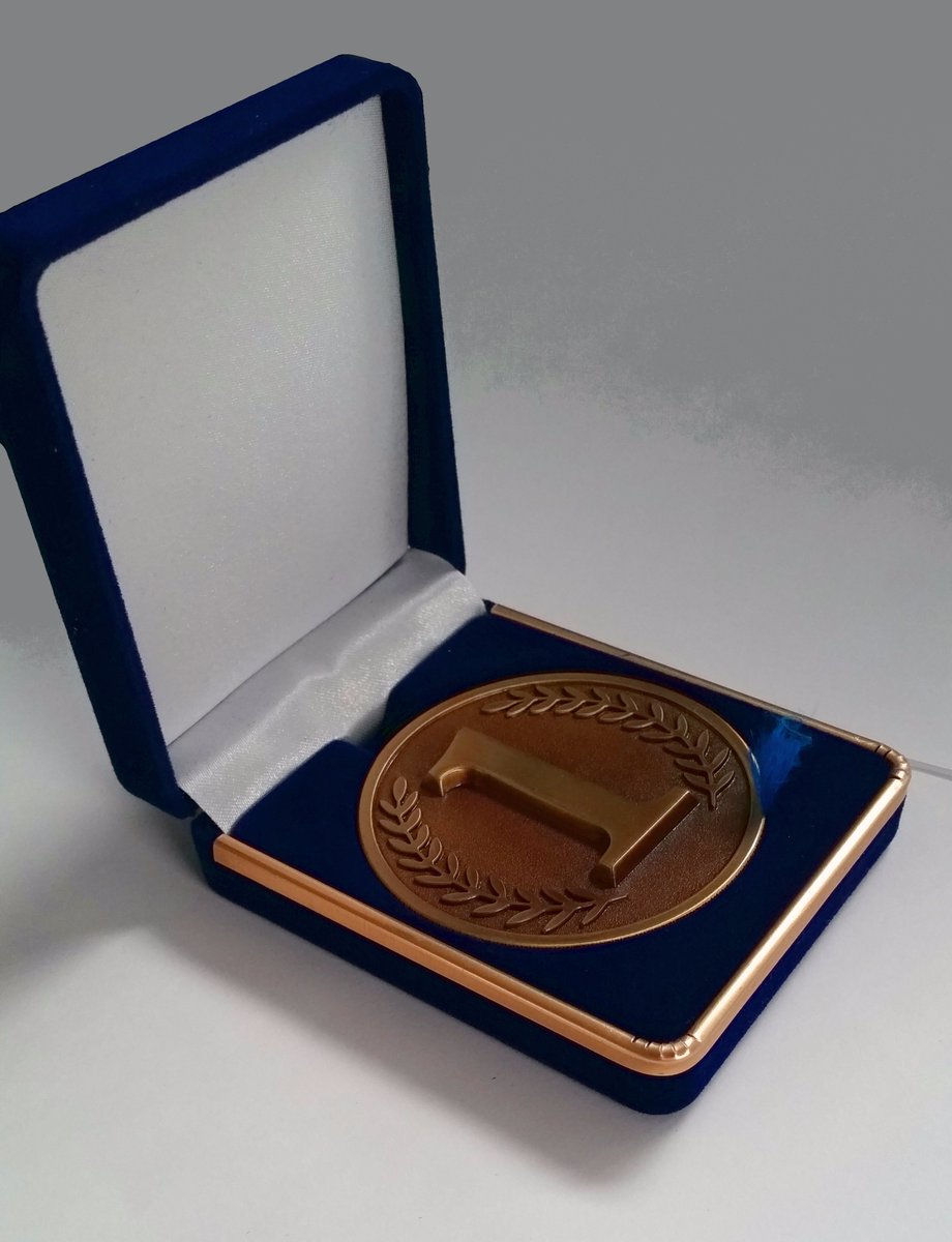 The community of Carlisle awarded a gold medal to show their gratitude for our foreman's hard work during the floods