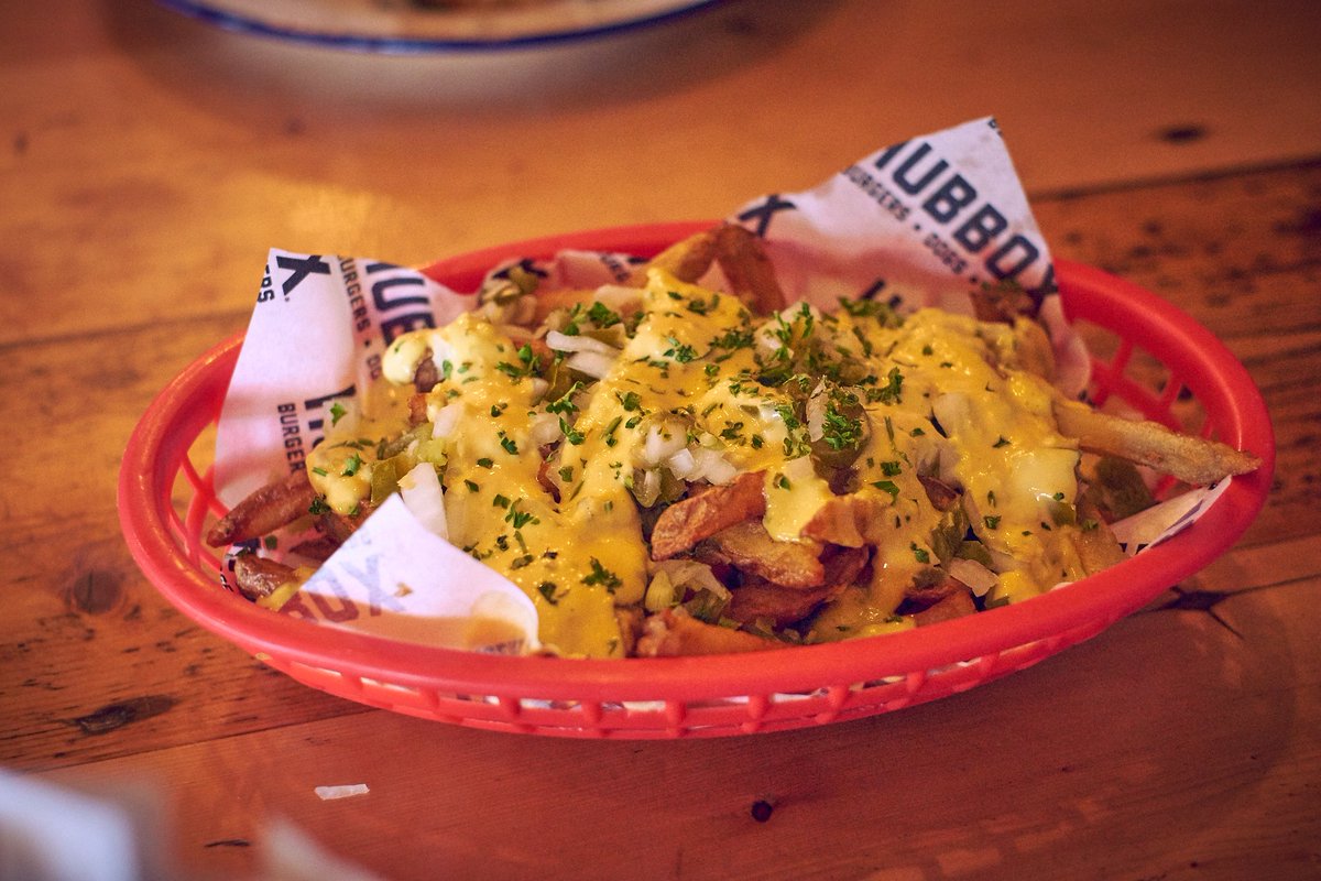 CheesyFries made dirty, topped with Hub sauce, diced white onions &amp; jalapenos. Ultimate side? #Hubbox <a href="/PentewanSands/">Pentewan Sands Holiday Park</a>
