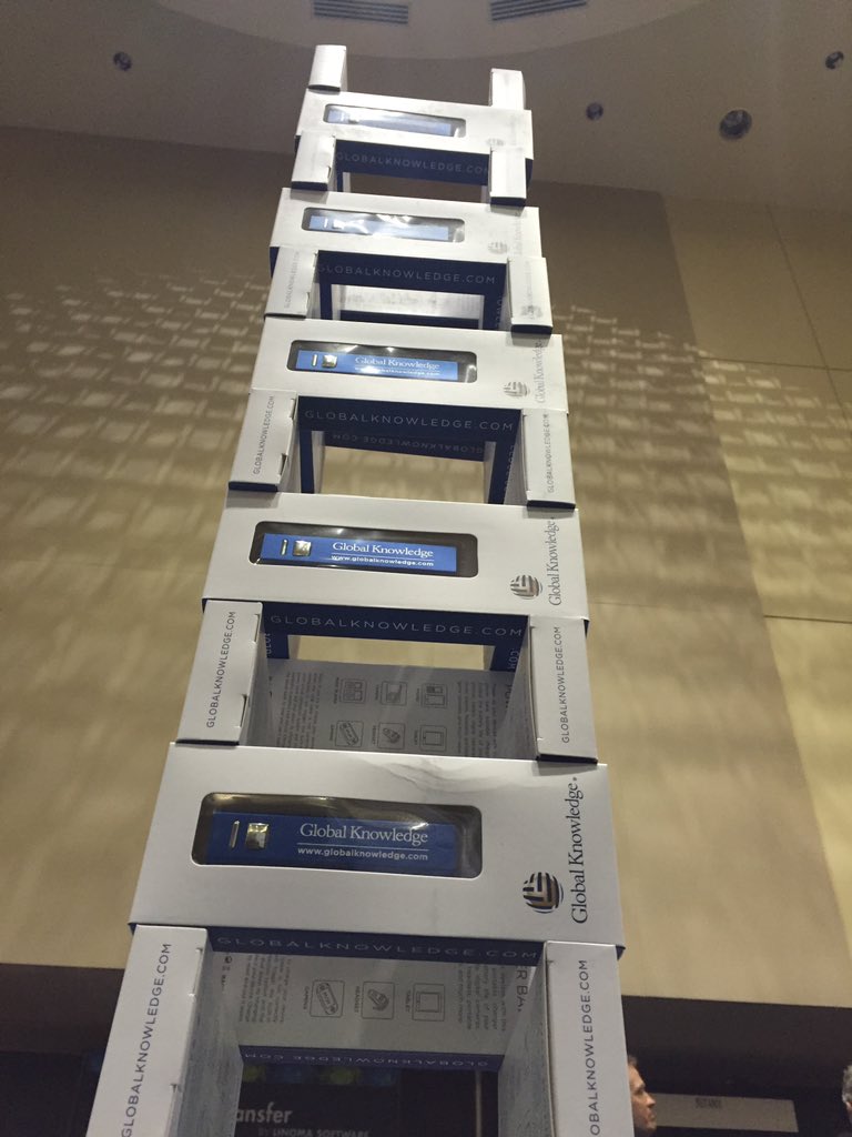 GKMeganBok's tweet photo. #leaningtowerofchargers at VMUG UserCon. Stop by for yours and learn about our #VMwareTraining #INDYVMUG @myVMUG https://t.co/R4gy5OlrL1