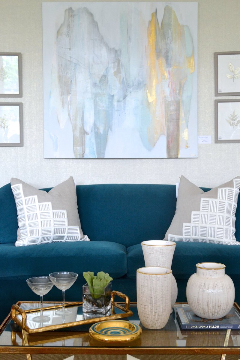 Beautiful, bold, and BLUE. We are in LOVE with this sofa! (And the art and accessories aren't too bad either!) ;)