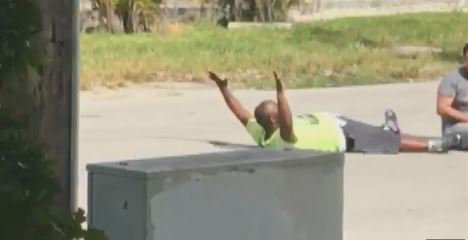 Video shows man on ground with hands up before being shot by #NorthMiami police. bit.ly/29V3MWk https://t.co/93dfu1Mlrc