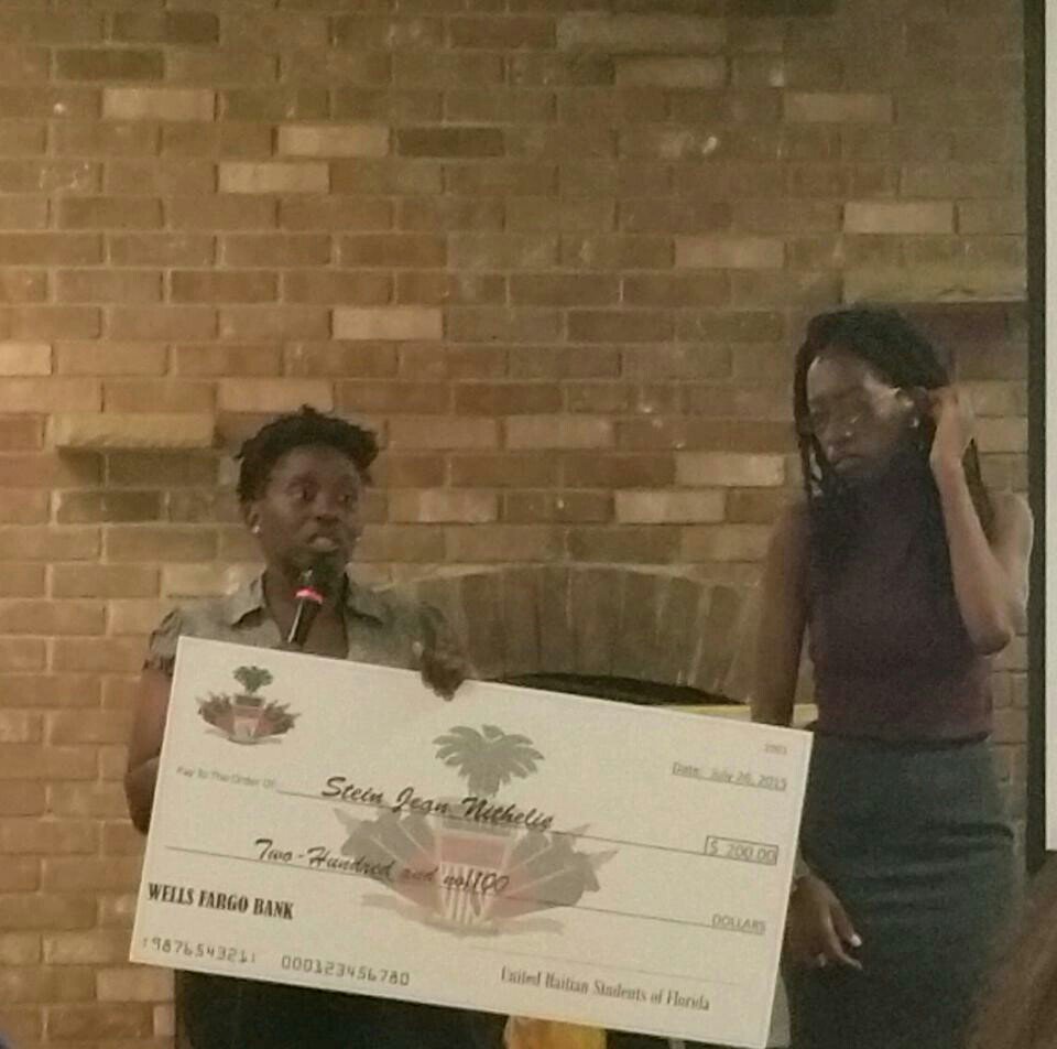 UHSFinc's tweet photo. #TBT to our Dir. of Legal Affairs Stine receiving the #UHSF Esther Dorilus Scholarship from our EVP the namesake https://t.co/cpJQs7kgqt
