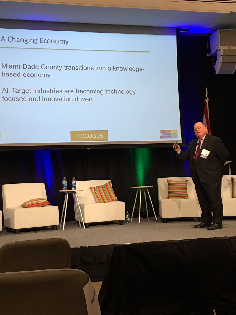 WashEcon's tweet photo. @TonyVillamil presenting the economic report for the #OCOG16 event for #Miami @beaconcouncil #Economics https://t.co/m4c0EKf6gm