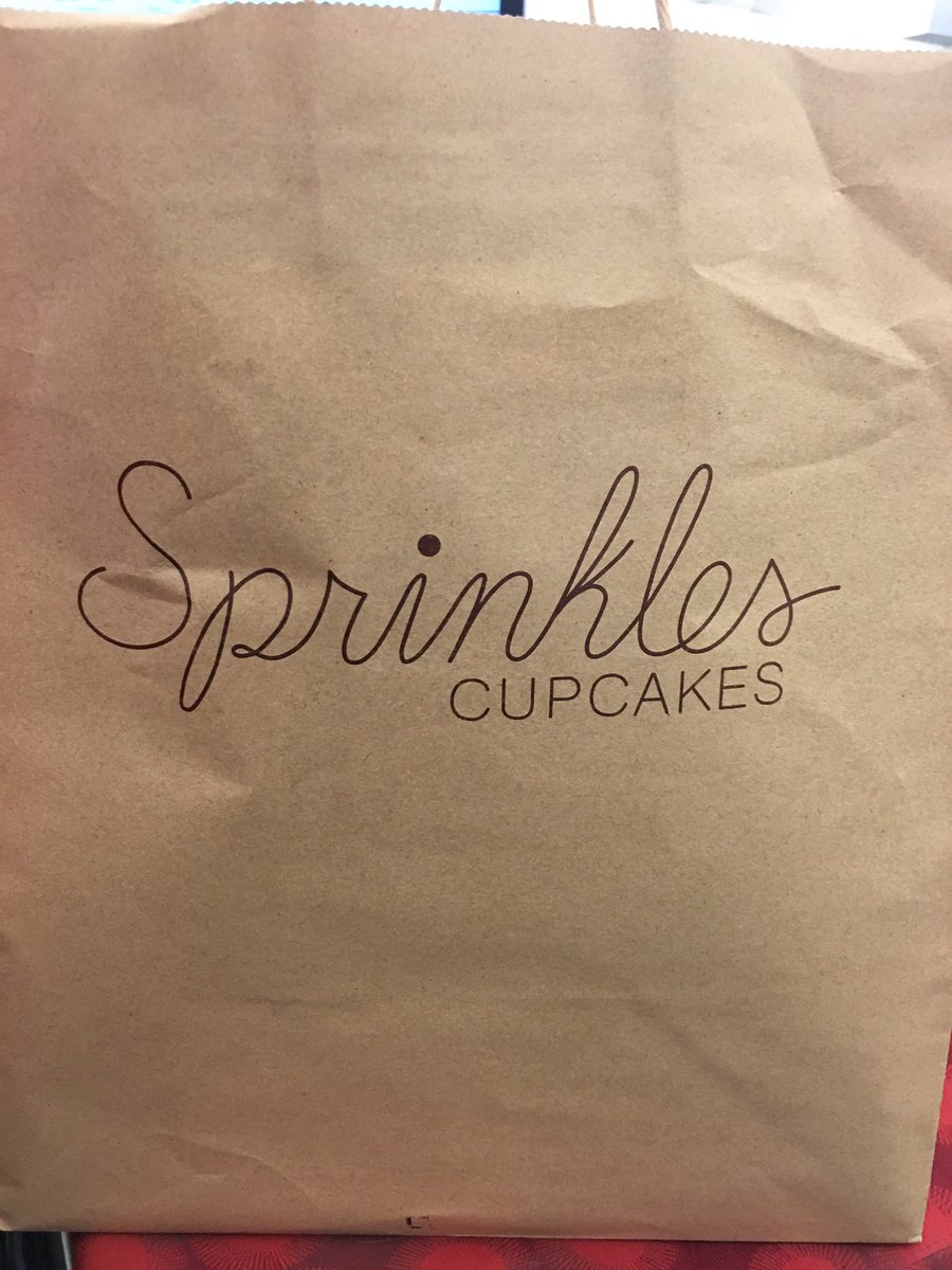 Belated birthday indulgence today for <a href="/RickMitchellWX/">Rick Mitchell</a> &amp; myself. Thanks, team for the calories. #workfam <a href="/sprinkles/">Sprinkles</a>