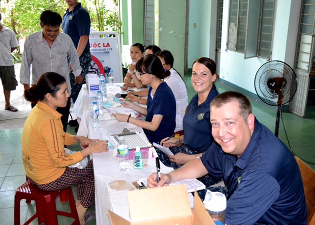 At a Vietnam facility registering patients for a collaborative clinic, YN1 Morrell and HM3 Sullivan. #lovework
