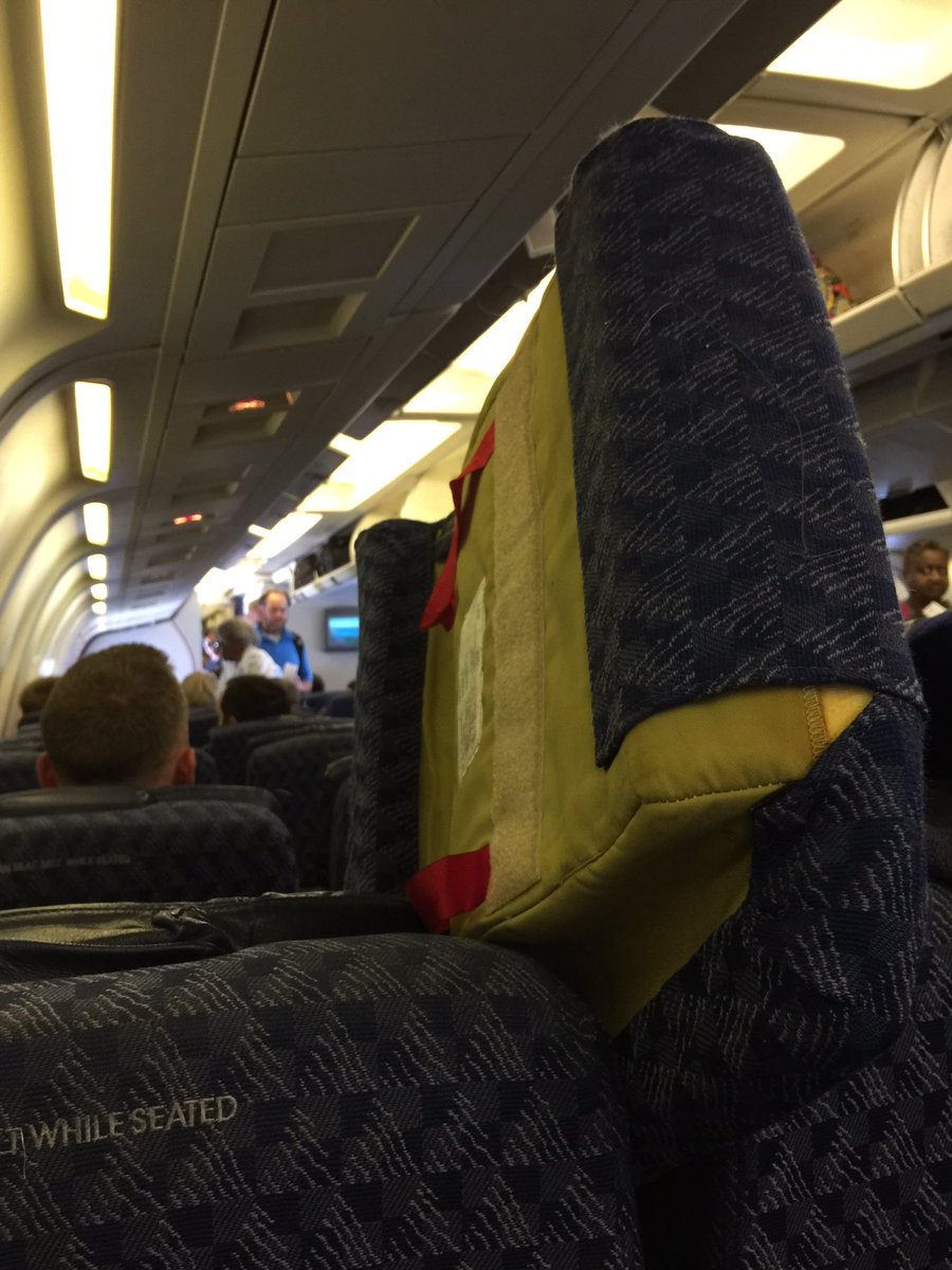 rowzar's tweet photo. @AmericanAir hoping that you all get this seat cushion out of my face before we take off. https://t.co/iFcKpsc7x7