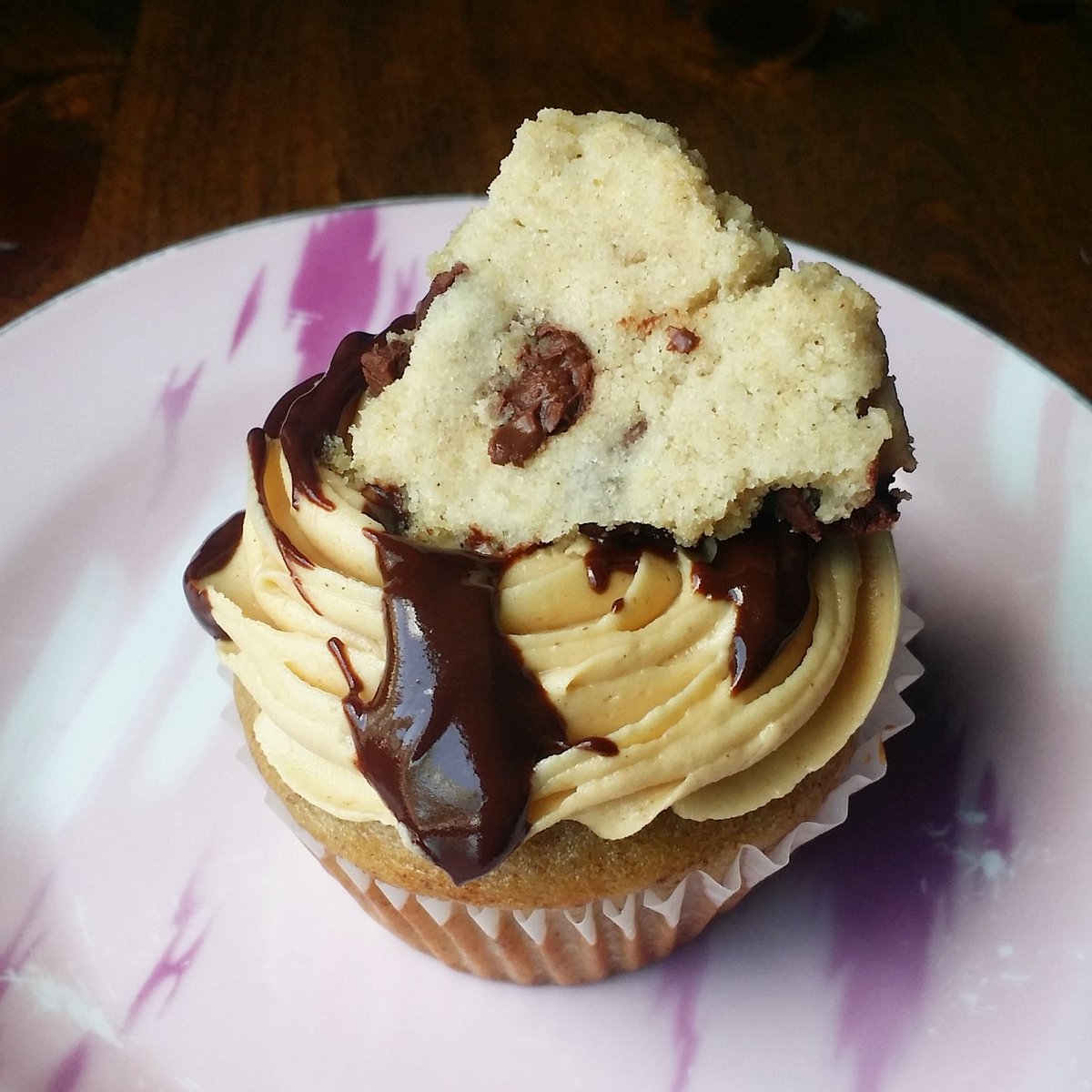 banana cake, peanut butter frosting, chocolate ganache, and a little chocolate chip cookie chunk! #whatveganseat