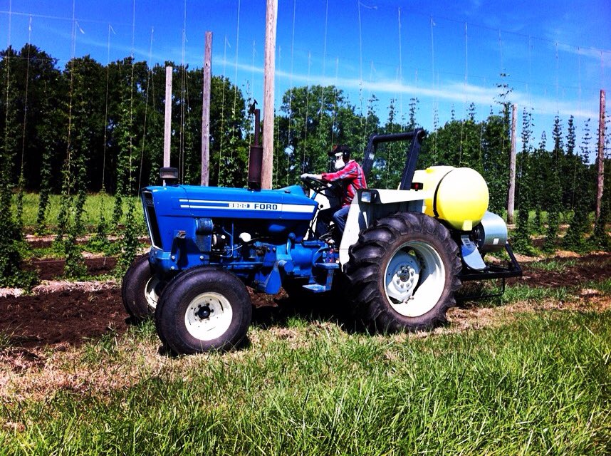 KansasHopCo's tweet photo. Spraying fungicide in the yard to help prevent disease & pests on the hop plants. #kshopco #kcbrewcrew #localhops https://t.co/RkciCXPboU