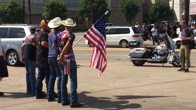 FOX4's tweet photo. Happening Now: Opposing groups protesting near NorthPark mall https://t.co/7u4J0NATum