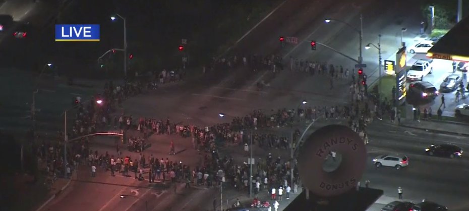 Dalrymple's tweet photo. Black Lives Matter protesters in Los Angeles are currently standing in a giant peace sign in an intersection https://t.co/nZGXoqnoQC