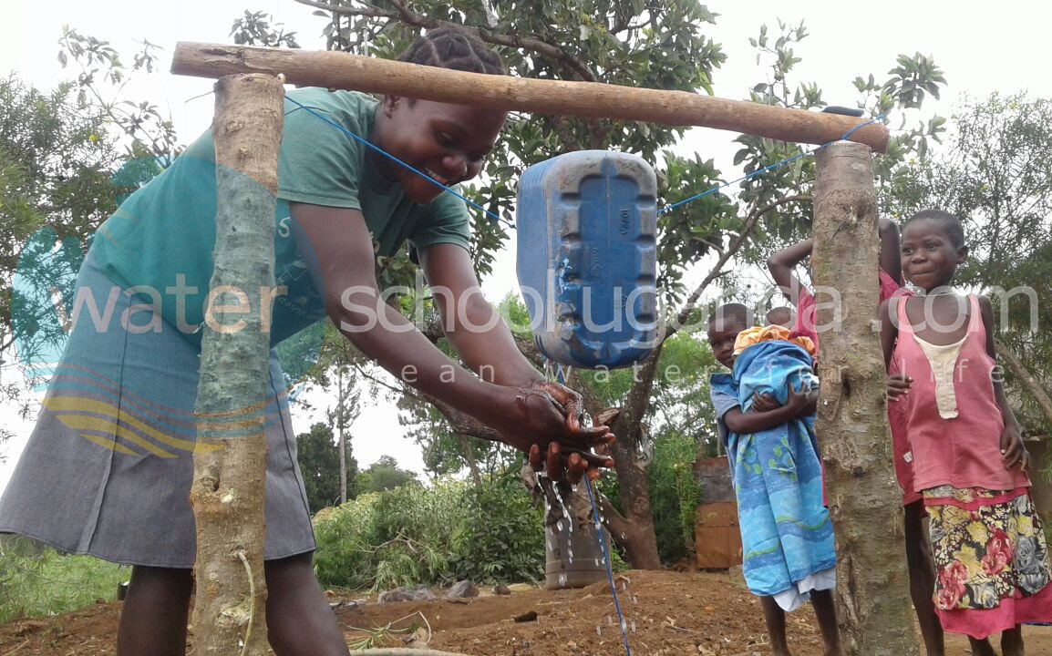 WaterSchool_UG's tweet photo. Good mothers lead by example for children. Always wash hands with soap after toilet and before eating. #handwashing https://t.co/xMNk25whjv