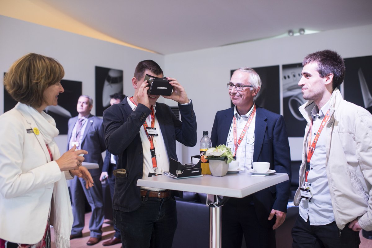 MHI_RJ's tweet photo. Guests experiencing the new #CRJ Series cabin design for themselves through a virtual tour #FIA16 https://t.co/zq49UrYCd4