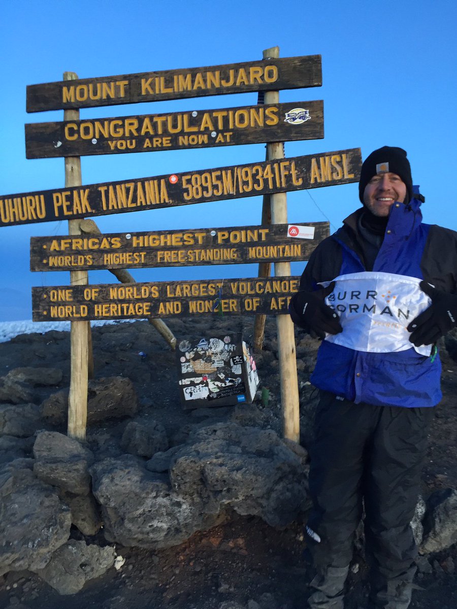 BurrForman's tweet photo. Fun: Burr’s @DerekFMeek recently climbed Mt. Kilimanjaro - and recreated his dad’s iconic 1974 photo atop the peak. https://t.co/dpa4ZtnE5x